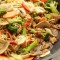 Noodles con bocconcini di maiale e verdure saltate