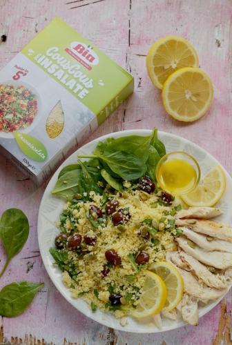 Cous cous con pollo al limone spinaci e olive taggiasche